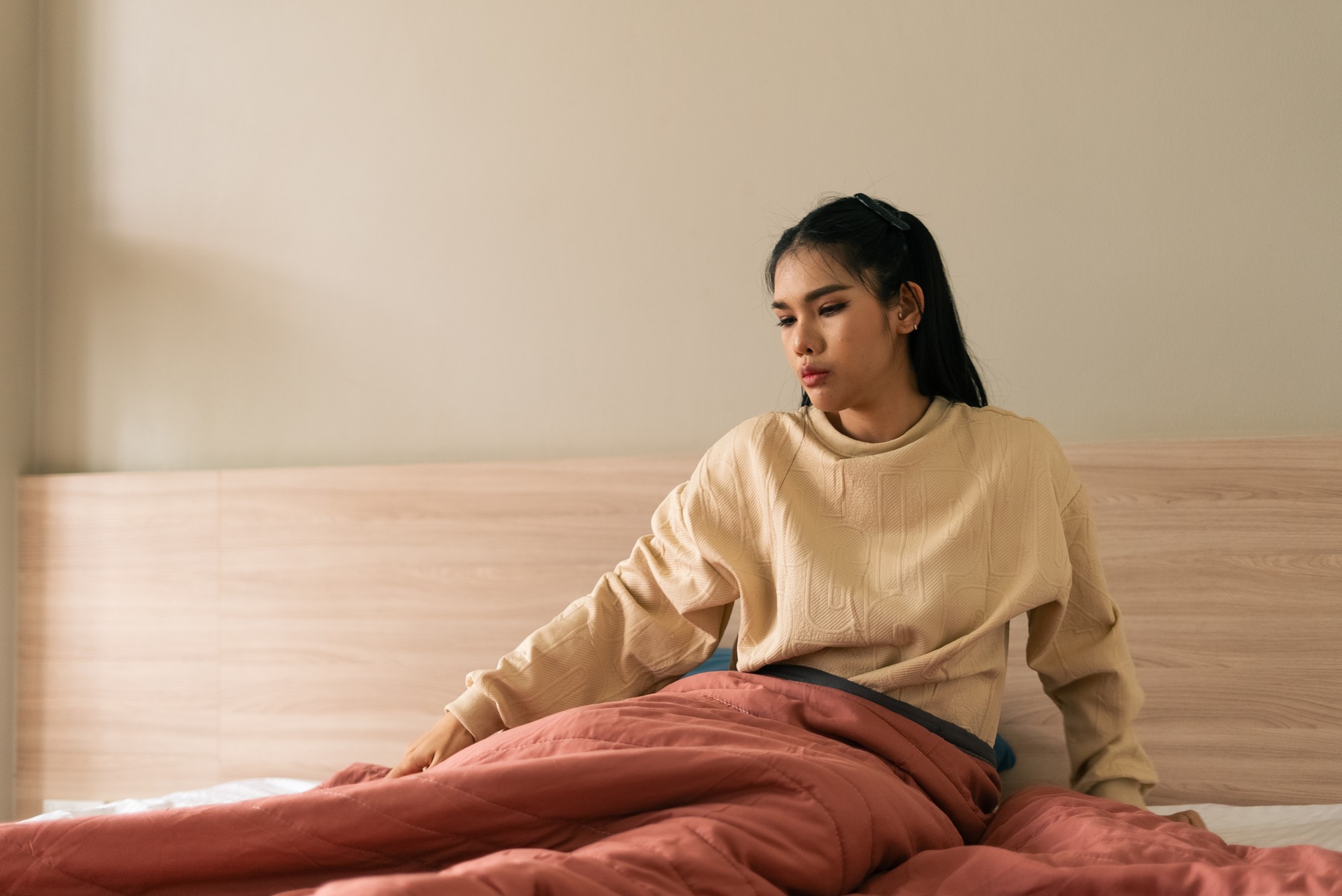 Post abortion support Woman sitting quietly in a reflective moment